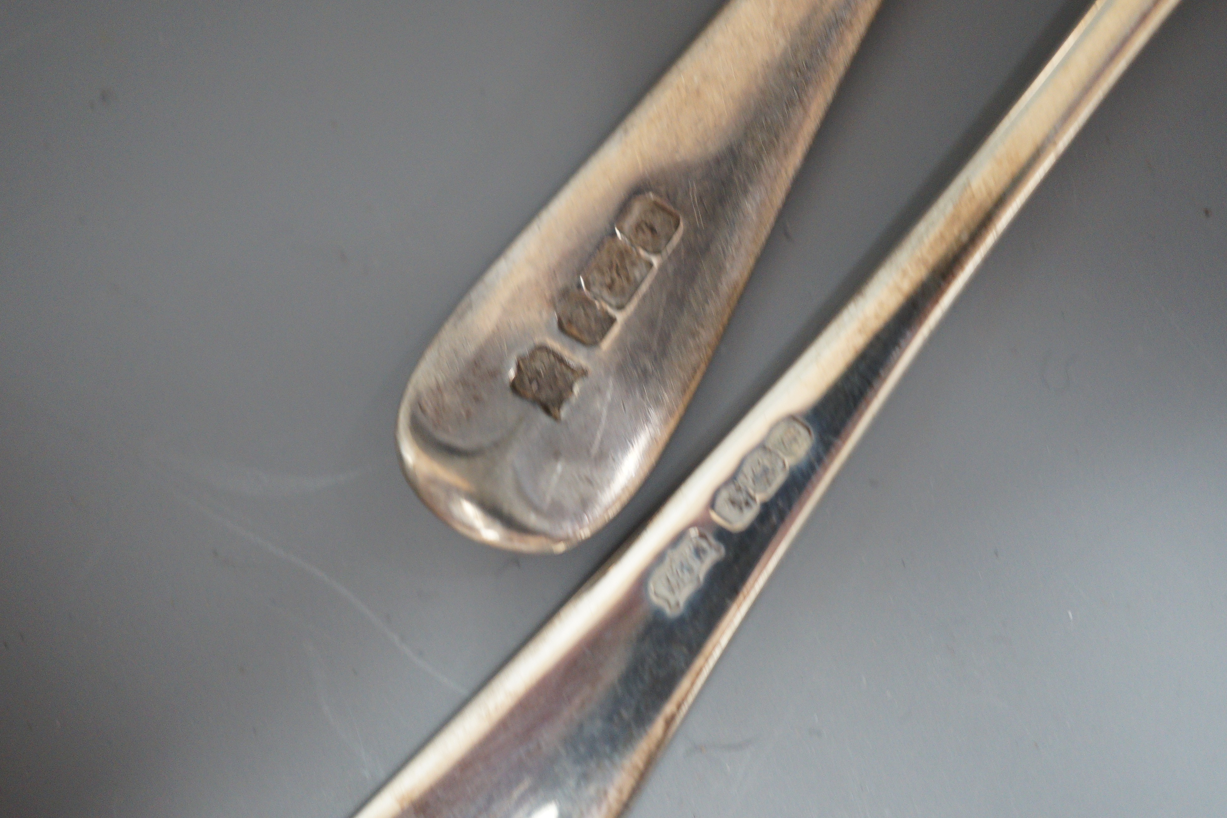 A cased set of six silver 1930's silver Old English pattern teaspoons, Mappin & Webb, Sheffield, 1936 and three other silver teaspoons.